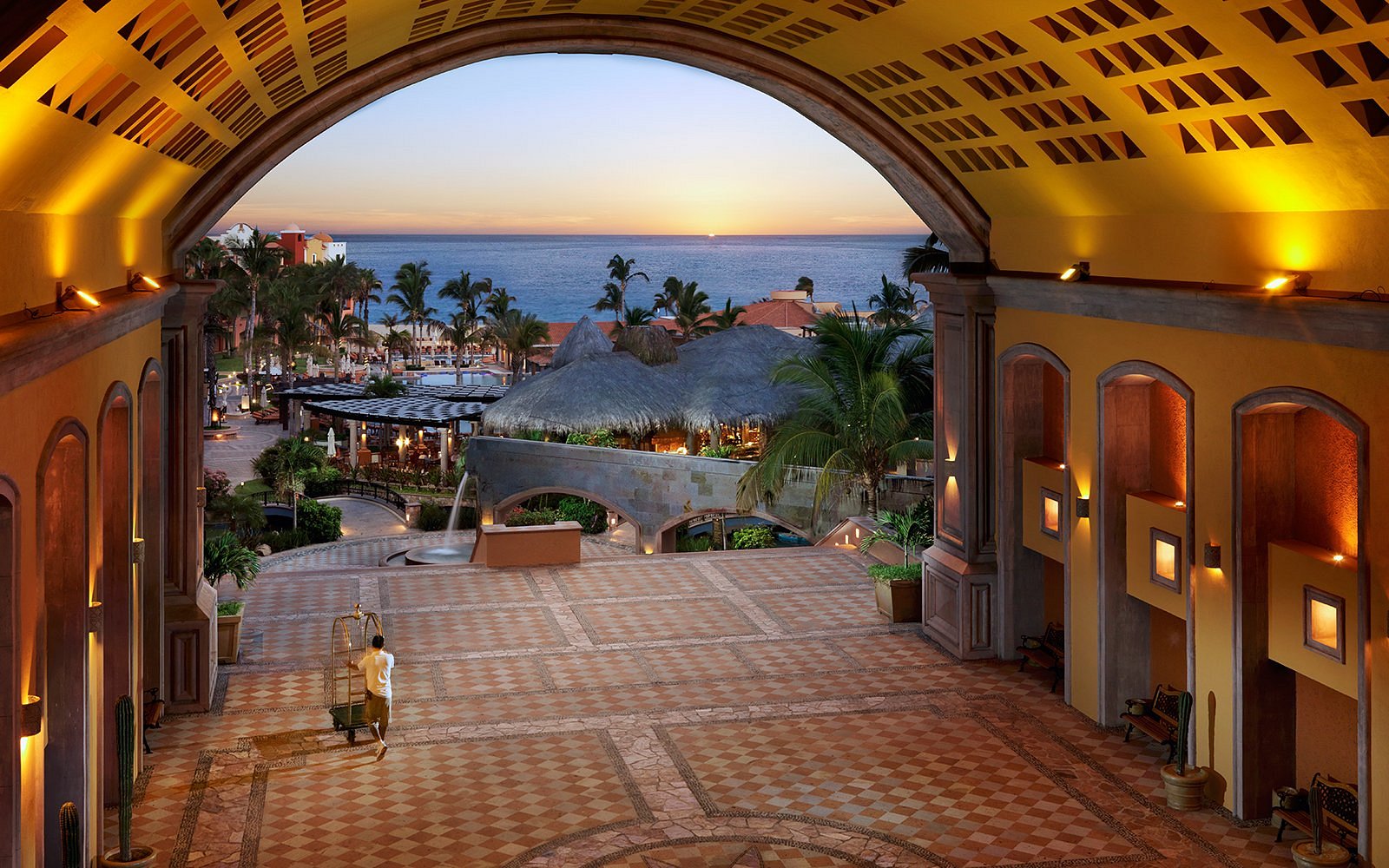 Resort lobby archway at sunset